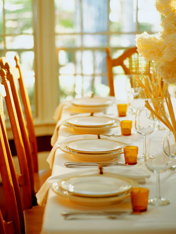 Here's another table setting from HGTV that plays with a tone on tone theme